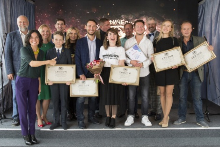 The winners of the second season of the All-Russian competition "The Best Guide of Russia" and the project jury members. Photo: press service of the Russian Geographical Society